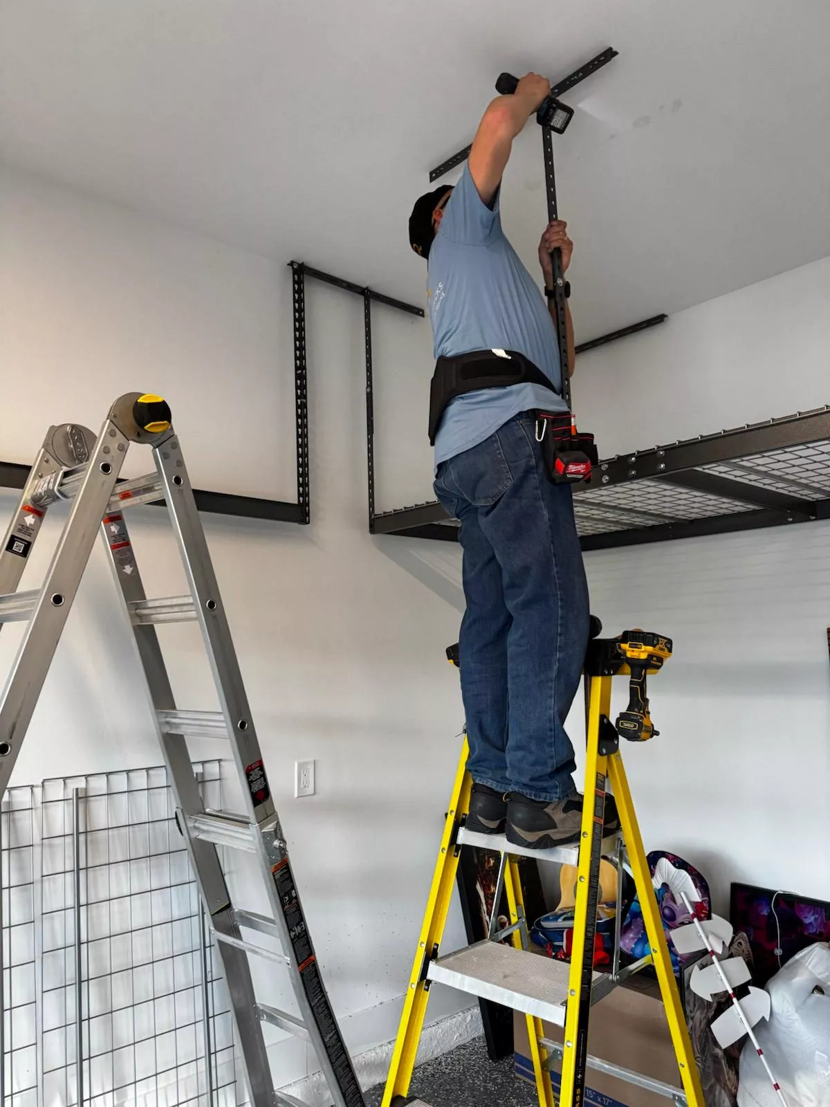 Heavy-duty overhead rack maximizing garage space in Collier County Florida